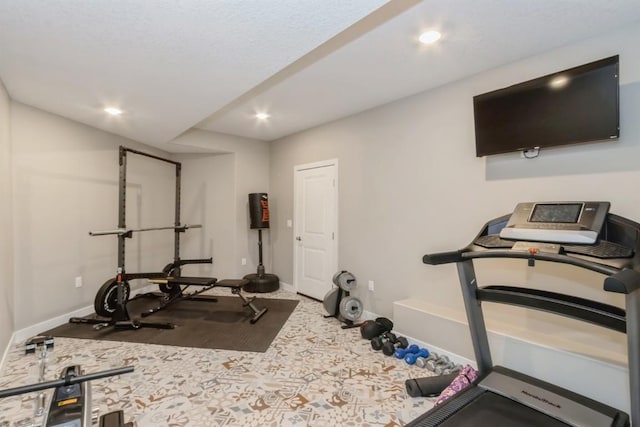 workout area featuring carpet, baseboards, and recessed lighting