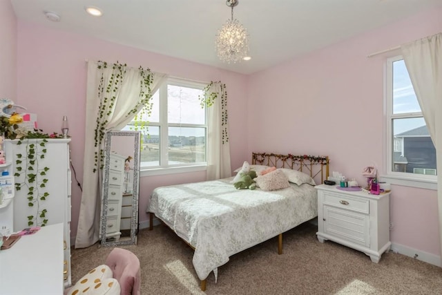 bedroom with recessed lighting, carpet flooring, an inviting chandelier, and baseboards