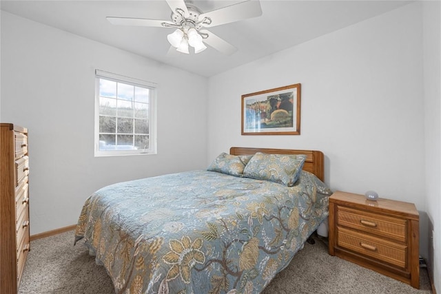 bedroom with carpet, baseboards, and ceiling fan