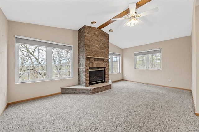 unfurnished living room featuring baseboards, carpet, and a ceiling fan