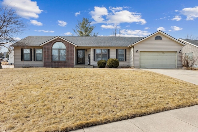 ranch-style home featuring brick siding, a shingled roof, a garage, driveway, and a front lawn