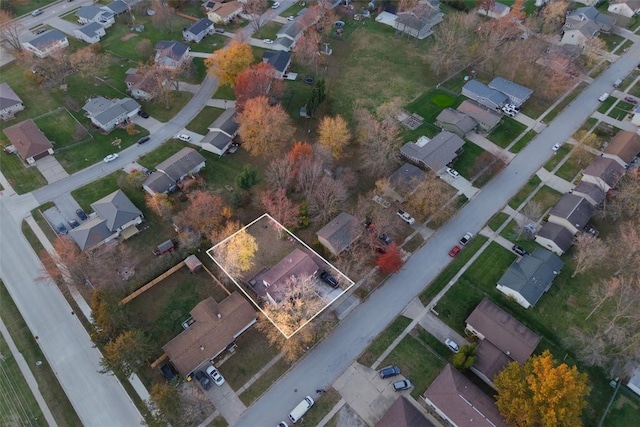 birds eye view of property with a residential view