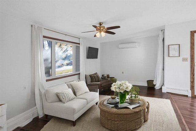 living area featuring dark wood-type flooring, a ceiling fan, a baseboard heating unit, a wall unit AC, and baseboards