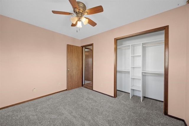 unfurnished bedroom featuring a closet, ceiling fan, baseboards, and carpet floors