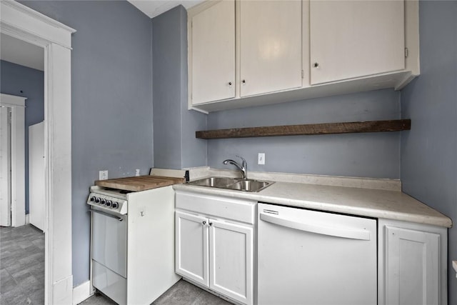 kitchen featuring white appliances, white cabinets, light countertops, open shelves, and a sink