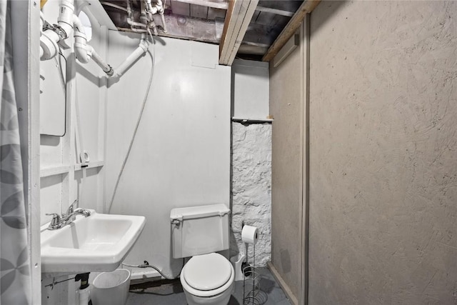 bathroom with a sink and toilet