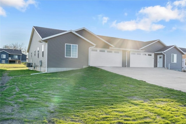 ranch-style home with concrete driveway, central air condition unit, an attached garage, and a front yard