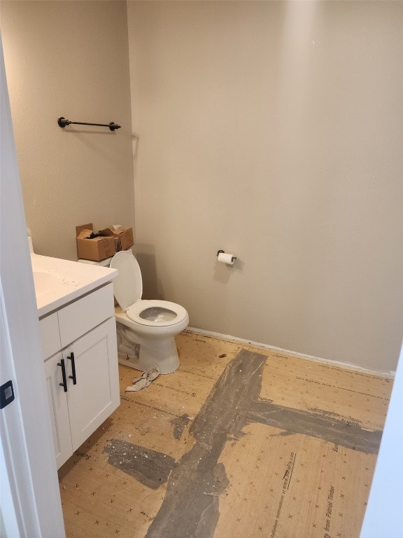 half bath with toilet and vanity