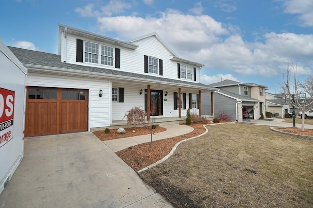 view of front of home with covered porch and concrete driveway