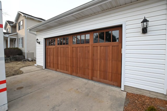 garage featuring driveway