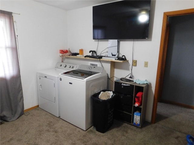 954 Monroe Ave, Tipton, IA 52772 - clothes washing area featuring light colored carpet and washer and dryer