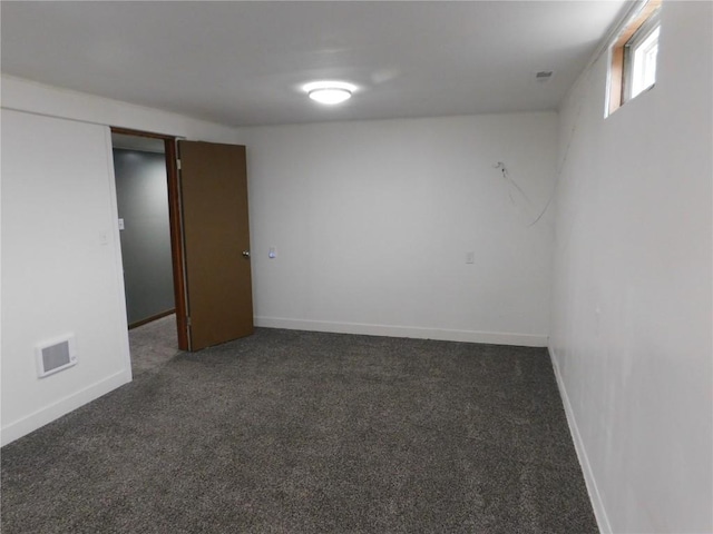 954 Monroe Ave, Tipton, IA 52772 - spare room with carpet floors and baseboards
