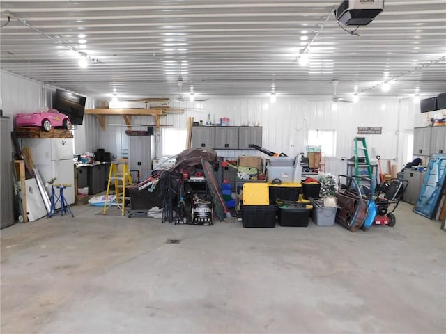 954 Monroe Ave, Tipton, IA 52772 - garage with a garage door opener