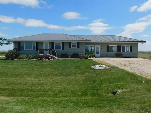 954 Monroe Ave, Tipton, IA 52772 - ranch-style home featuring a front yard and metal roof