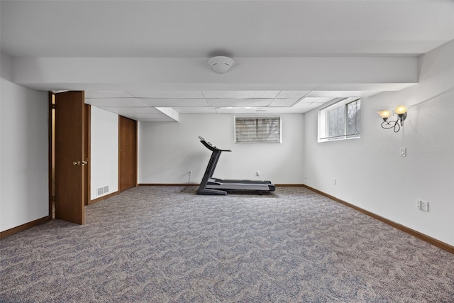 workout room featuring baseboards, visible vents, and carpet flooring