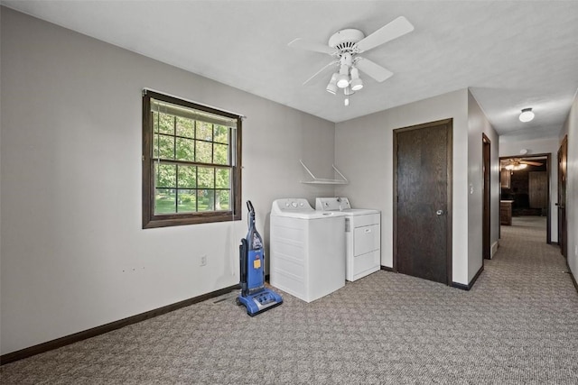 washroom featuring ceiling fan, carpet floors, separate washer and dryer, and baseboards