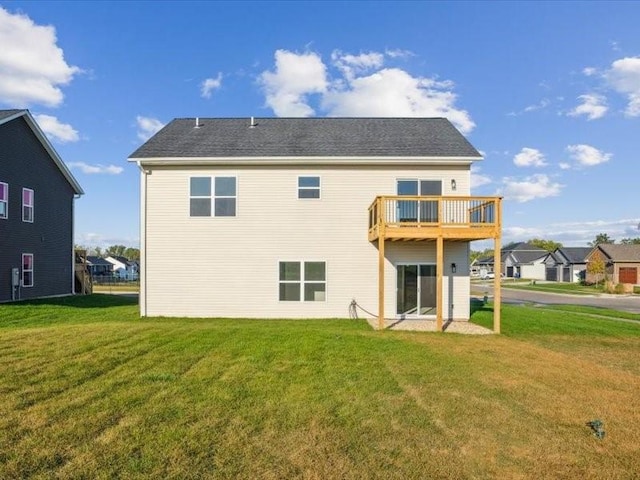 back of house with a yard