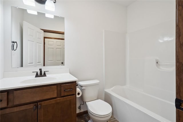 full bathroom with toilet and vanity