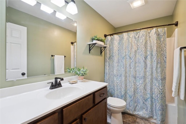 bathroom with toilet, shower / bathtub combination with curtain, and vanity