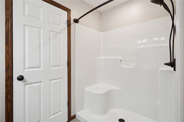 bathroom with a stall shower