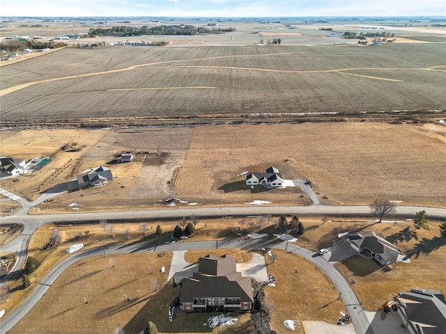 birds eye view of property featuring a rural view