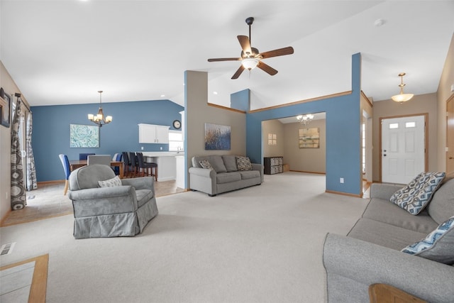 living room featuring lofted ceiling, light carpet, ceiling fan with notable chandelier, visible vents, and baseboards