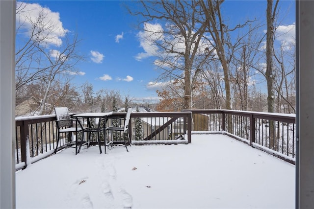 view of snow covered deck