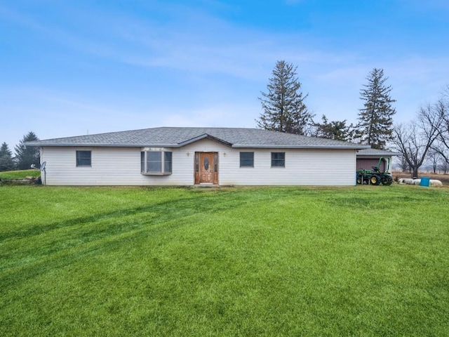 single story home with a front yard