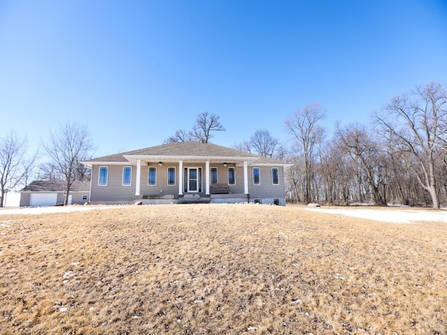 ranch-style house with covered porch