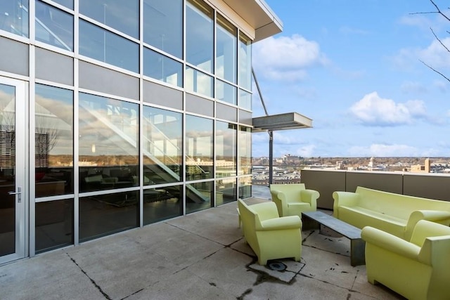 view of patio / terrace featuring a package area and an outdoor living space