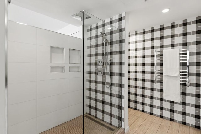 bathroom featuring a stall shower and recessed lighting