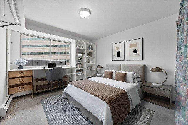 400 1st St SE Unit 203, Cedar Rapids, IA 52401 - bedroom featuring concrete floors and baseboard heating
