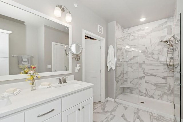 full bath with marble finish floor, visible vents, a shower stall, and vanity