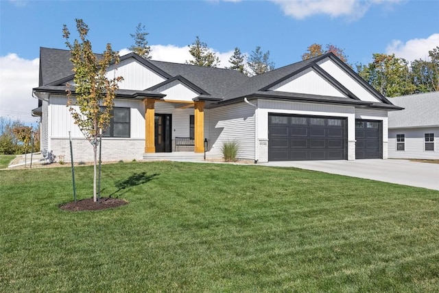 modern farmhouse with an attached garage, brick siding, a shingled roof, concrete driveway, and a front yard