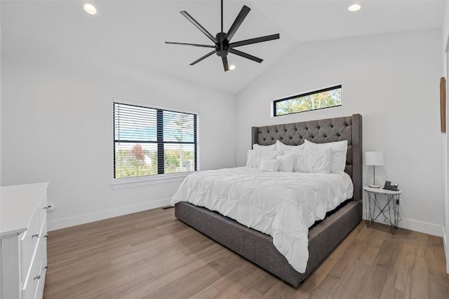 bedroom with light wood finished floors, baseboards, vaulted ceiling, and recessed lighting