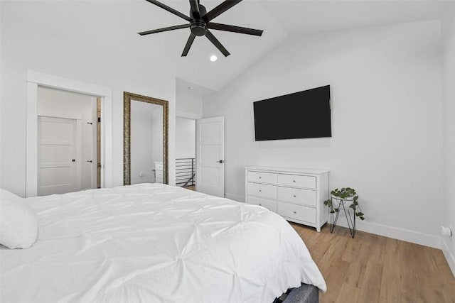 bedroom featuring light wood finished floors, baseboards, a ceiling fan, vaulted ceiling, and recessed lighting