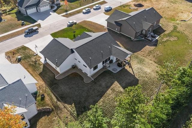 drone / aerial view with a residential view