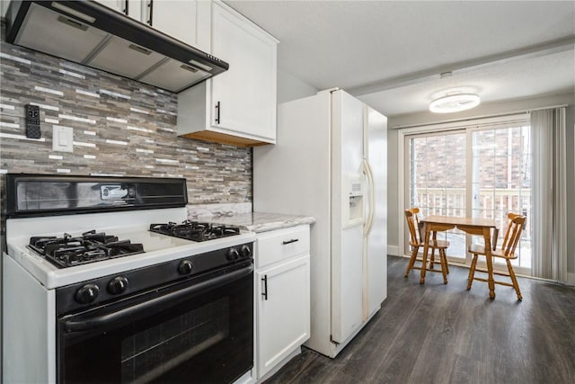 kitchen with under cabinet range hood, white appliances, dark wood-type flooring, white cabinets, and tasteful backsplash