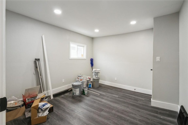 game room featuring baseboards, wood finished floors, and recessed lighting