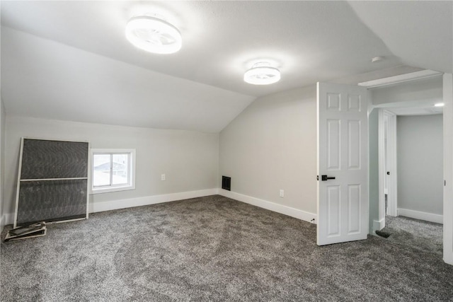 bonus room with carpet floors, lofted ceiling, and baseboards