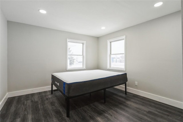 playroom with baseboards, dark wood-style flooring, and recessed lighting