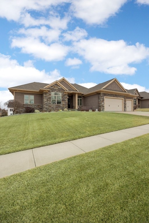 ranch-style house with stone siding, an attached garage, and a front yard