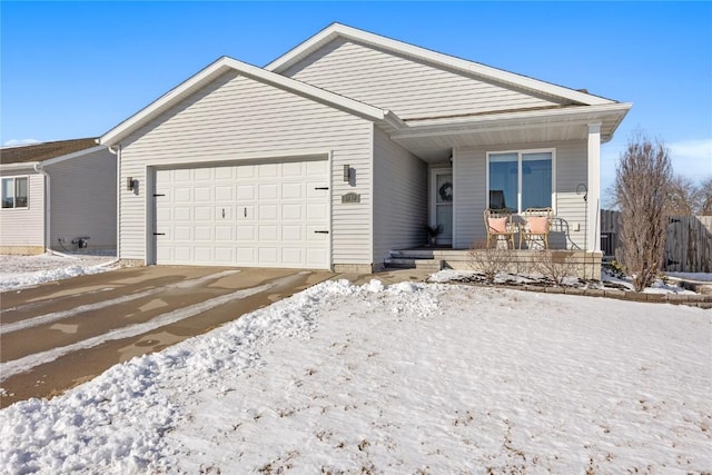 ranch-style home with a garage, covered porch, and fence