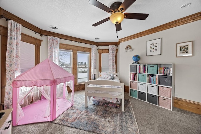 bedroom featuring a textured ceiling, carpet, visible vents, and crown molding