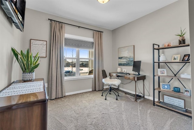 office space with carpet floors and baseboards