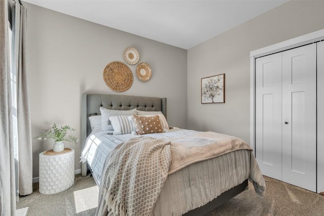 carpeted bedroom featuring a closet