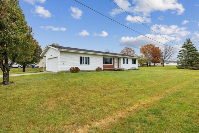 single story home featuring a garage, driveway, and a front yard