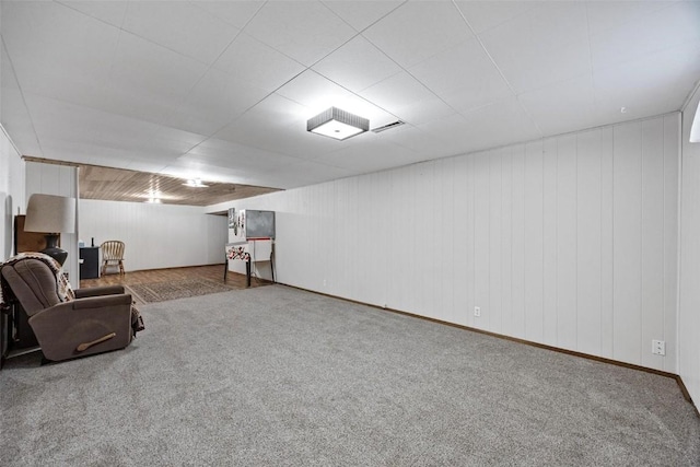 finished basement with carpet flooring