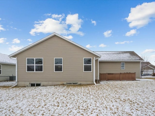 view of snow covered house