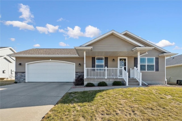 ranch-style house with a front lawn, a porch, concrete driveway, stone siding, and an attached garage